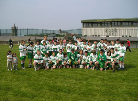 The ‘A’ and ‘B’ teams of Aodh Ruadh celebrate after victories in their respective finals of the Willie Rogers under 12 tournament in Ballyshannon last Saturday.