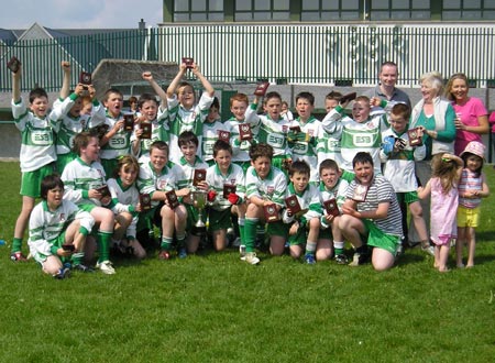 Aodh Ruadh celebrate after victory in the Willie Rogers under 12 tournament in Ballyshannon last Saturday.